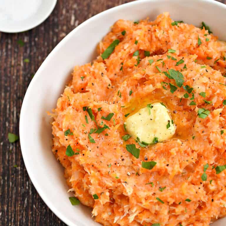 Instant Pot Mashed Carrots and Parsnips topped with butter.