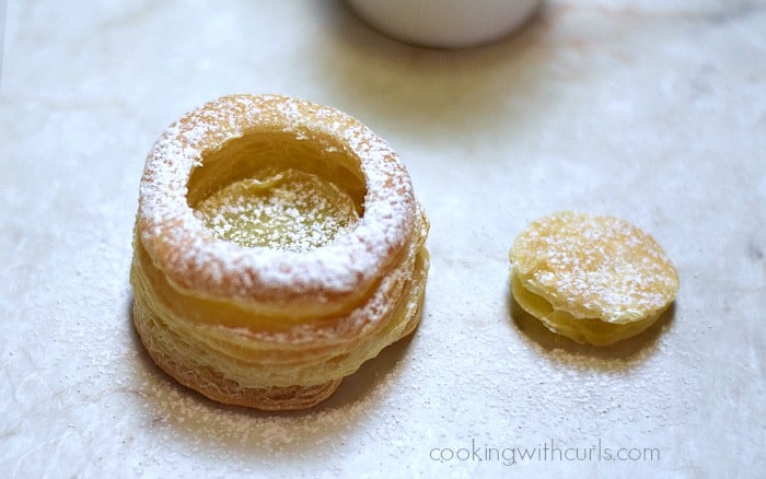 Puff pastry shell dusted with powdered sugar.