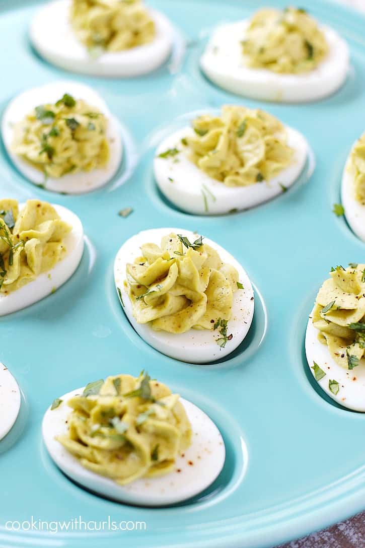 Sweet Pea Deviled Eggs in a pale blue egg plate